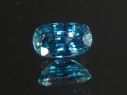 Pill shaped blue Zircon cushion - pretty wide while shallow, best value affordable zircon gem with sky blue C+ to B- color grade. 