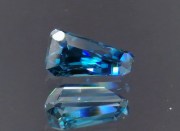 Grade AAA color, rare extremely high hue fancy tapered baguette / trapezoid natural blue zircon of 6.59ct
